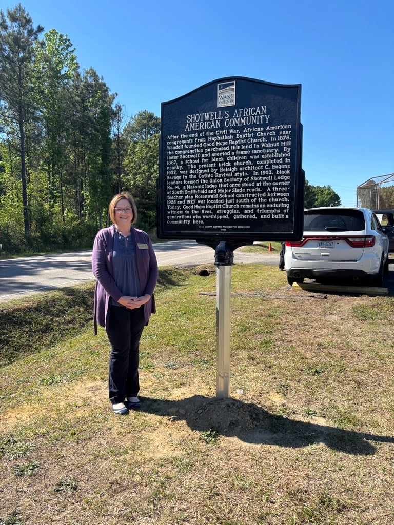 Craig with Historic Preservation Sign