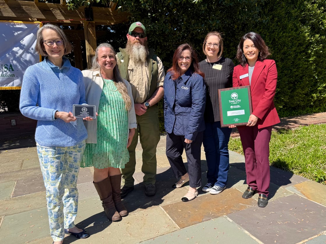 councilmembers with arbor day attendees
